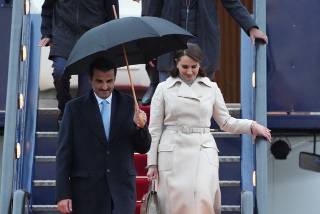 The Emir of Qatar Sheikh Tamim bin Hamad Al Thani and Sheikha Jawaher arrive at Stansted Airport in Essex for a state visit (Joe Giddens/PA)