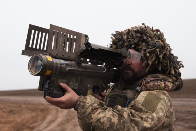 <p> A machine gunner with the 118th Separate Mechanized Brigade's firing team holds an American FIM-92 Stinger man-portable air defense missile system for reconnaissance and destruction of Russian drones</p>