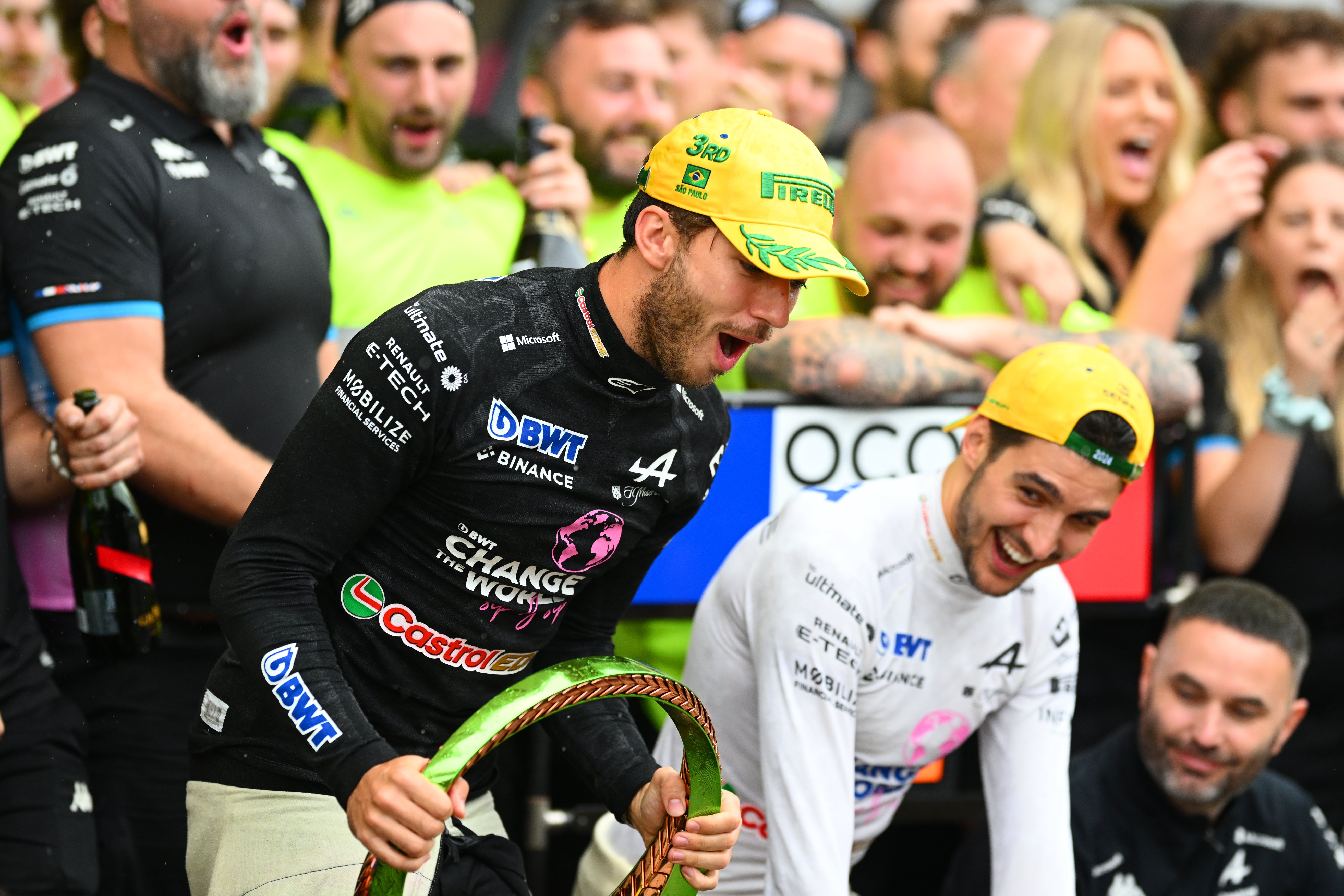 Esteban Ocon (right) and Pierre Gasly celebrate Alpine’s double podium in Brazil