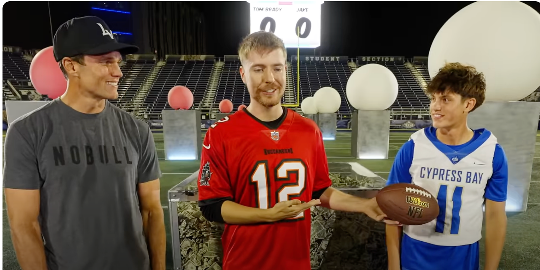 Brady and Balanovich had to pop four ballons by throwing a football in MrBeast’s YouTube challenge