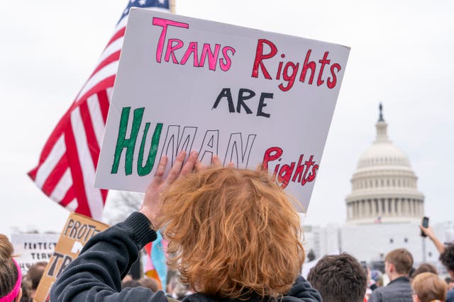 <p>Demonstrators march in Washington, D.C., to support transgender rights. A groundbreaking Supreme Court case could decide whether bans on gender-affirming care for minors are unconstitutional </p>