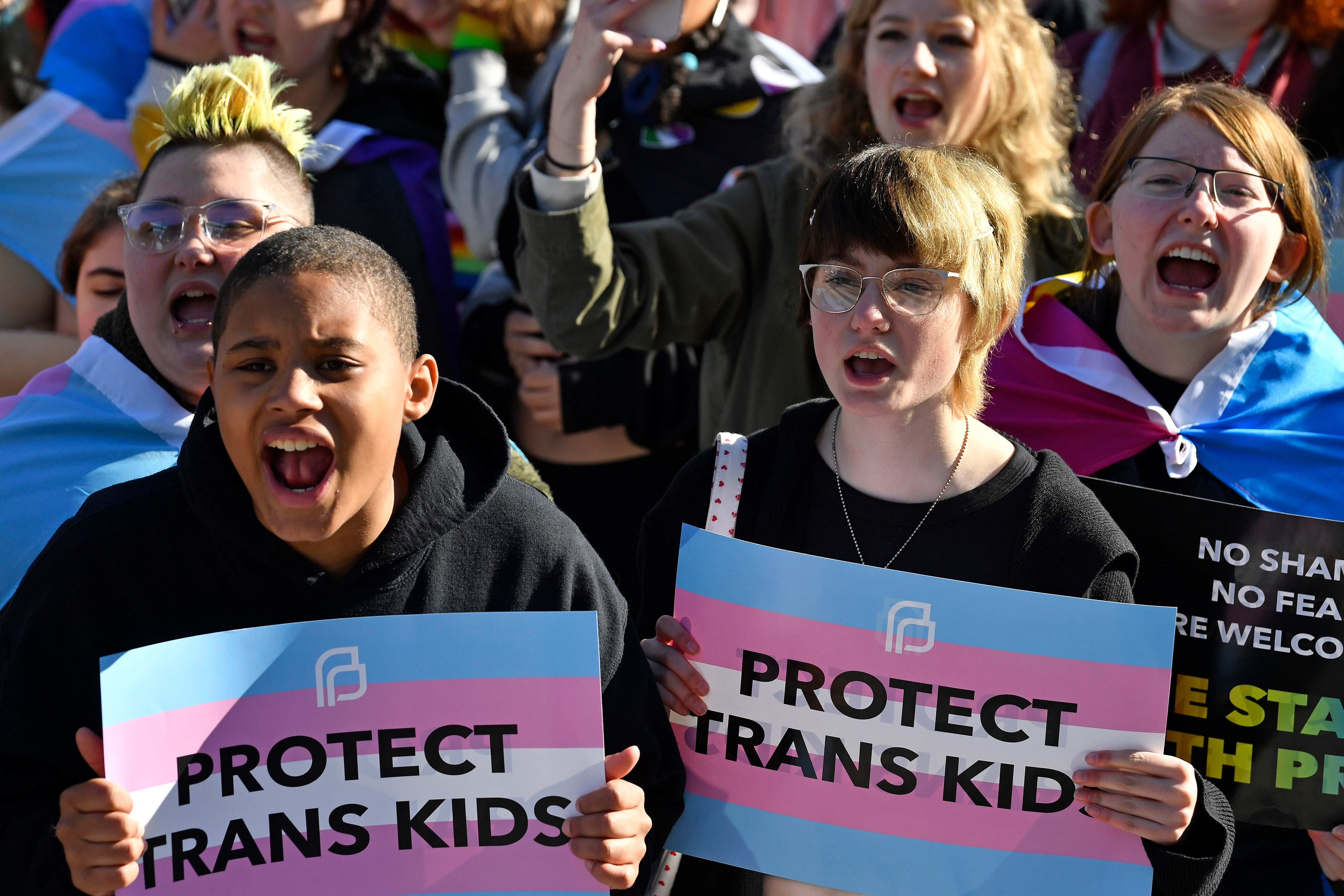 Protesters demonstrationg against Kentucky legislation targeting trans healthcare rally outside the state’s capitol in 2023