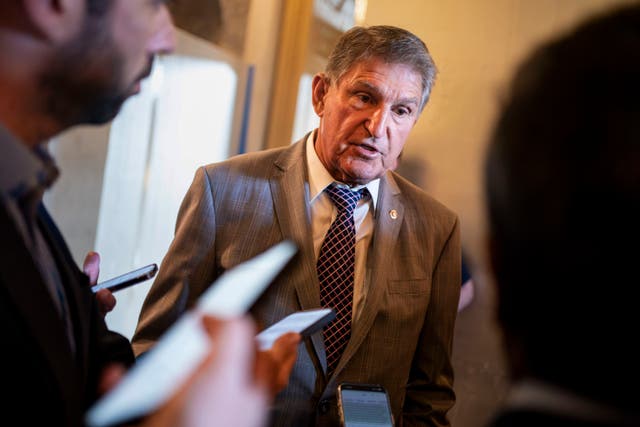 <p>Sen. Joe Manchin speaks to reporters before an afternoon vote at the U.S. Capitol in Washington, DC, earlier this year </p>