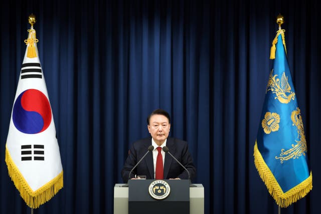 <p>South Korean President Yoon Suk-Yeol speaks during the declaration of emergency martial law at the Presidential Office in Seoul, South Korea </p>