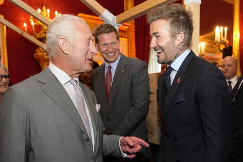 <p>The King and the football icon together at a previous event (Kirsty Wigglesworth/PA)</p>