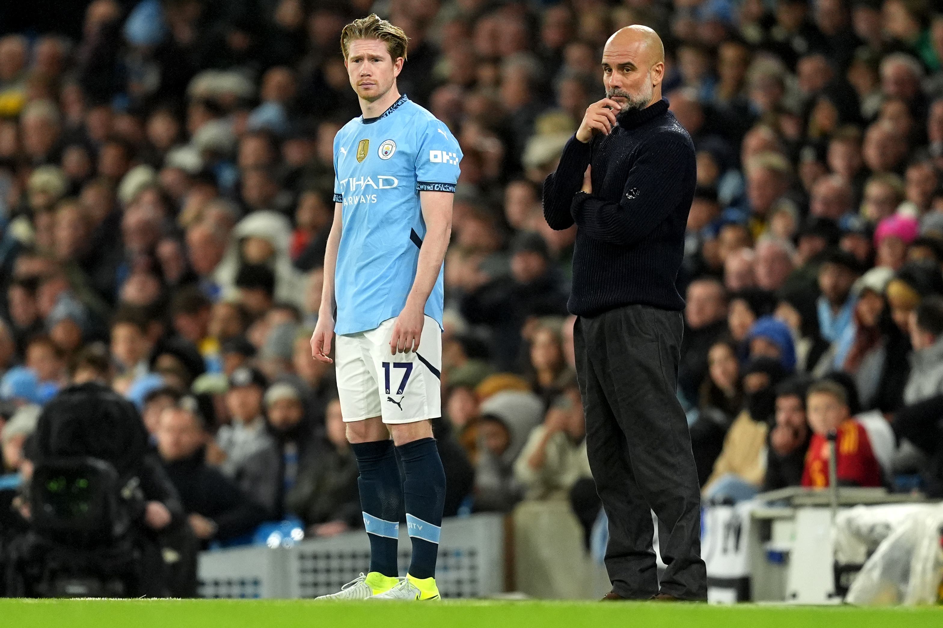 Pep Guardiola (right) has denied there are issues between him and Kevin De Bruyne (left) (Martin Rickett/PA)