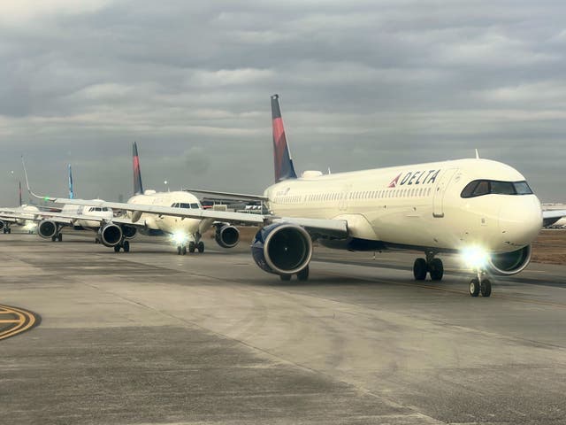 <p>Going places: Aircraft queuing for take-off at New York JFK airport</p>