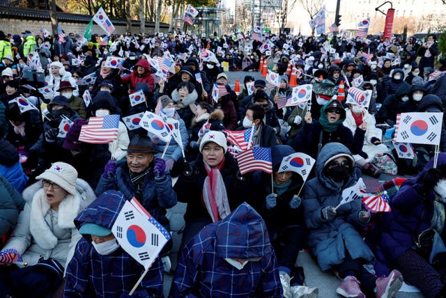 <p>Protesters from conservative groups attend a rally supporting South Korean President Yoon Suk Yeo</p>