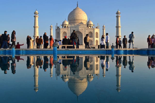 <p>File. Tourists visit the Taj Mahal during early morning in Agra on 15 February 2023</p>