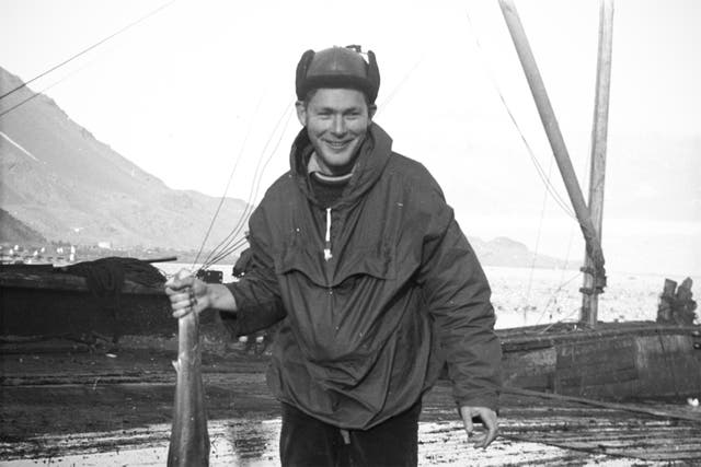 <p>Goldsmith on a boat near South Georgia Island during the Trans-Antarctic Expedition</p>