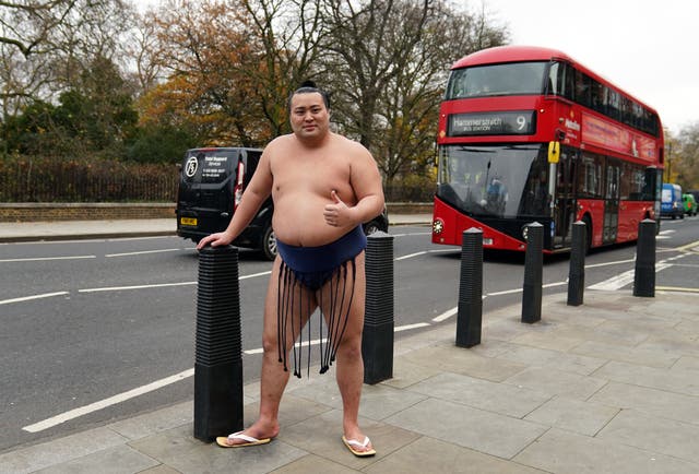 <p>Sumo wrestler Kitanowaka Daisuke outside the Royal Albert Hall, London,</p>