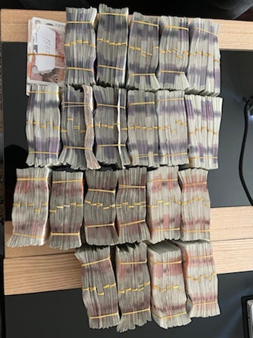 Bundles of cash seized during the Jersey investigation