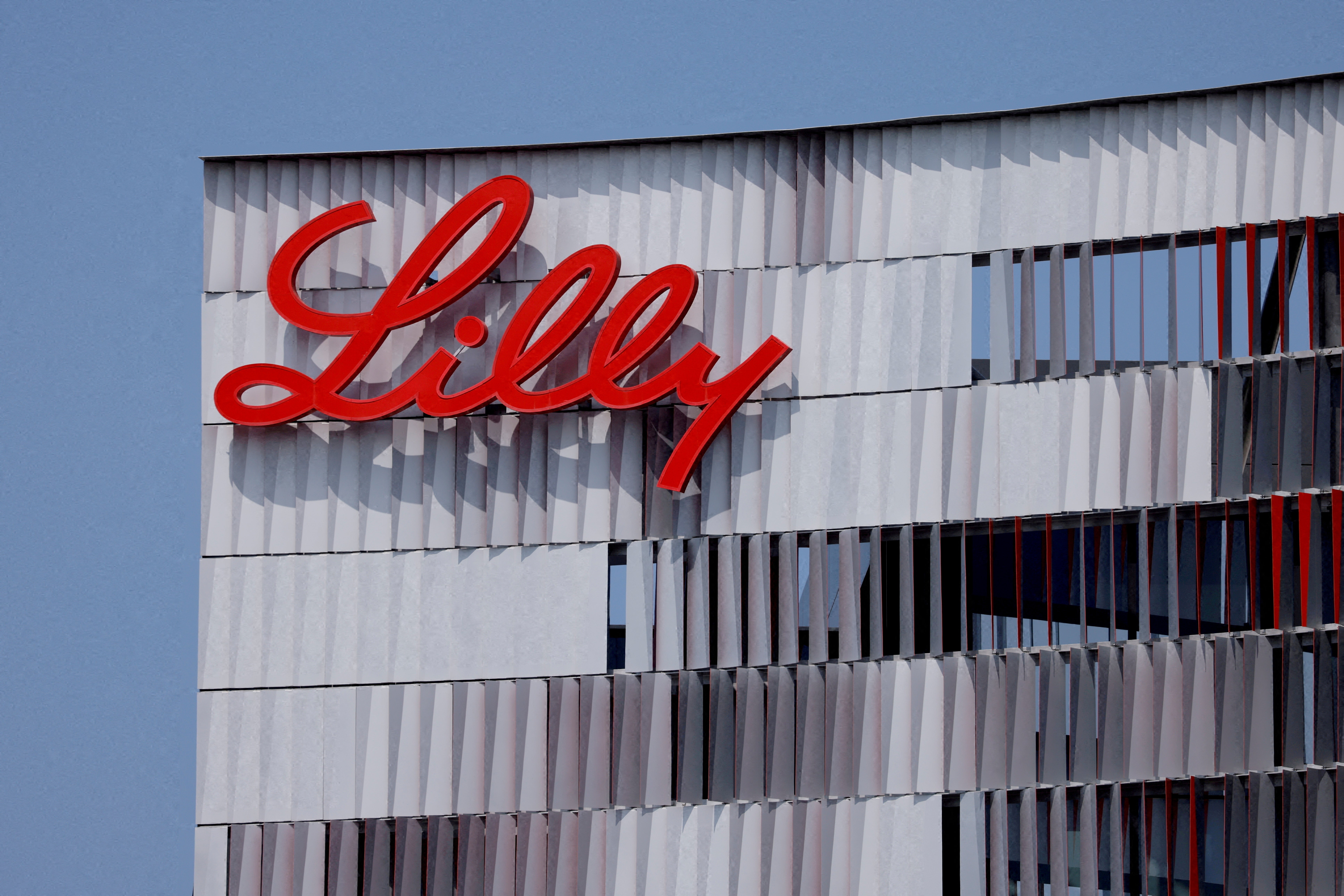 The drugmaker Eli Lilly’s logo is seen on one of the company’s buildings in San Diego, California, in September 2020. The drugmaker said a clinical trial showed patients using the obesity drug Zepbound lost more weight than those who were given its competitor