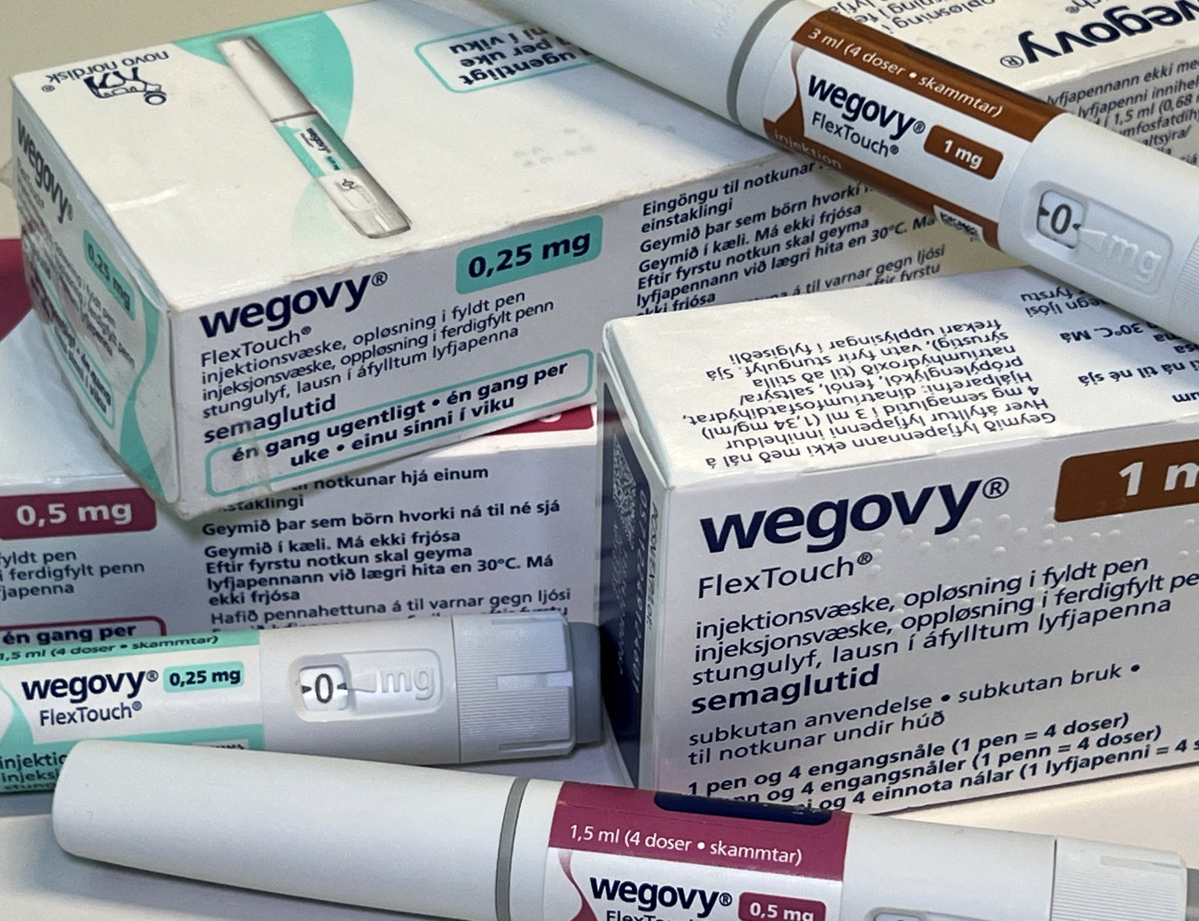 Injection pens and boxes of Novo Nordisk’s weight-loss drug Wegovy are seen in November 2023. The FDA approved a new indication for use for Wegovy earlier this year