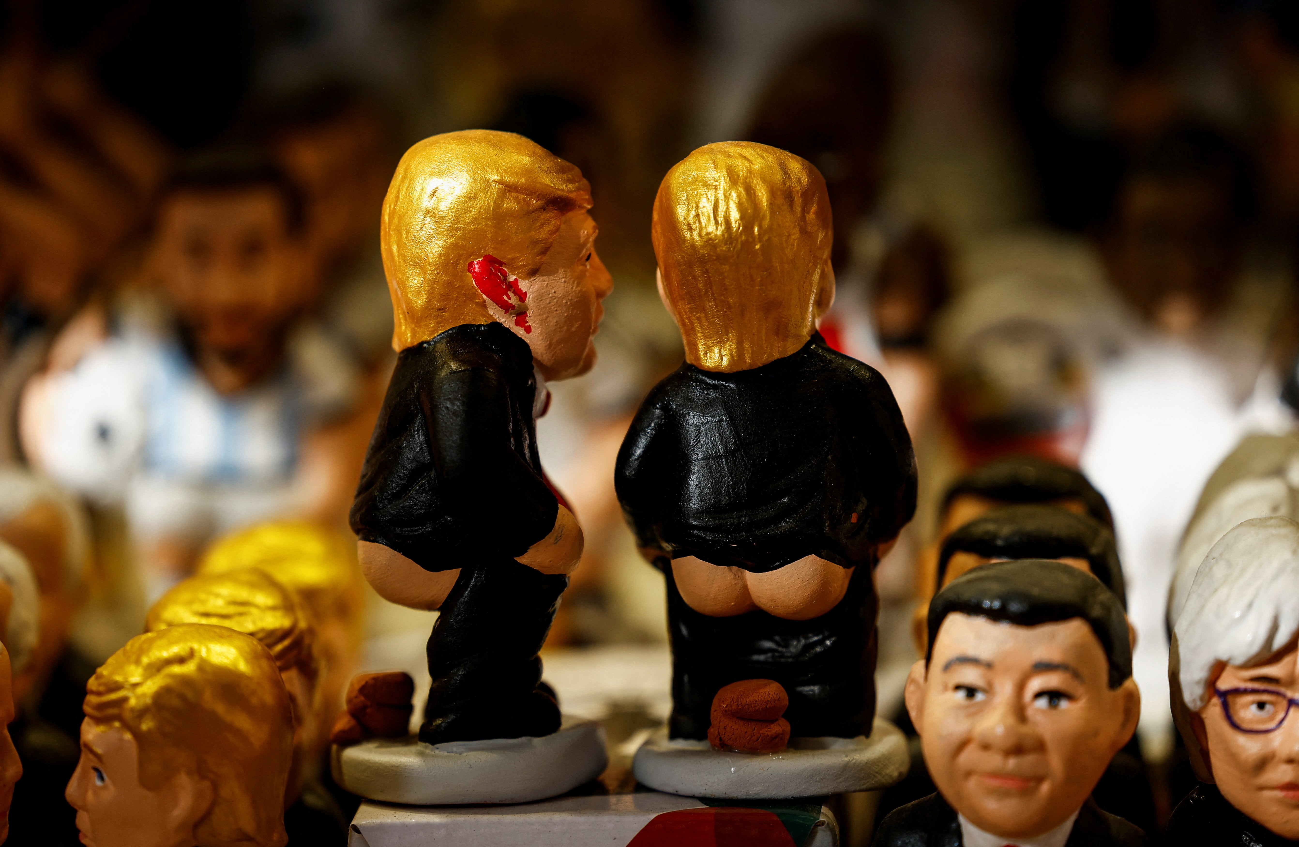 Catalan traditional figurines 'caganers’ (poopers), which symbolise defecation and fertilisation of the earth and are believed to bring prosperity and luck for the coming year, including ones representing U.S. President-elect Donald Trump