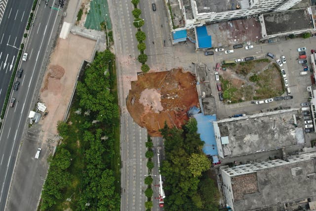 <p>In this photo released by Xinhua News Agency, an aerial view shows the collapsed ground at a construction site on a section of the Shenzhen-Jiangmen Railway in Shenzhen, south China’s Guangdong Province Thursday, 5 December 2024</p>