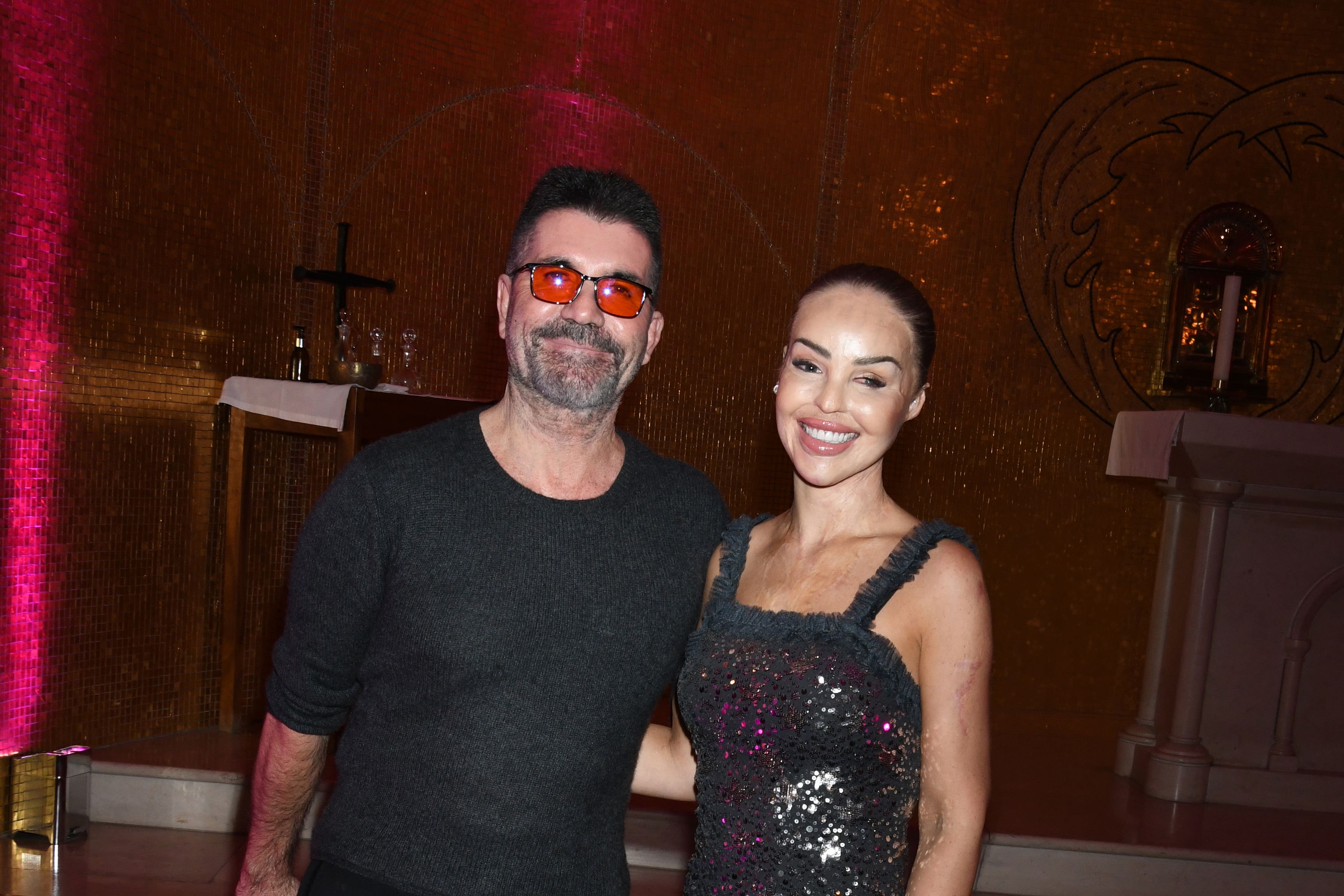 Katie Piper and Simon Cowell at the third annual Katie Piper Foundation Carol Concert . Pictures: Zak Walton.