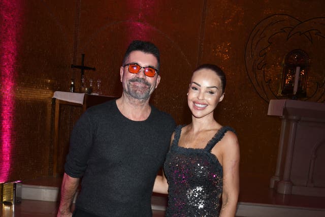 Katie Piper and Simon Cowell at the third annual Katie Piper Foundation Carol Concert . Pictures: Zak Walton.