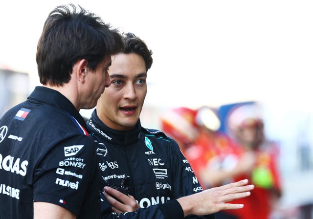 <p>Russell talks with Mercedes executive director Toto Wolff ahead of the Abu Dhabi Grand Prix at Yas Marina Circuit on 5 December</p>