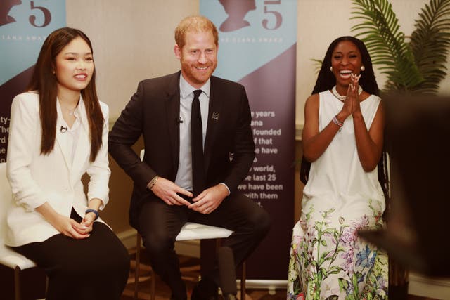 The Duke of Sussex filming his message with Legacy Award recipients Chiara Riyanti Hutapea Zhang and Christina Williams (The Diana Award/PA)