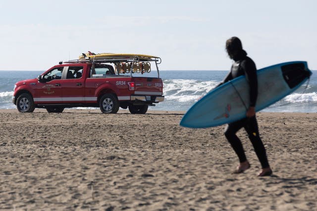 <p>A San Francisco Surf Rescue team evacuates surfers from Ocean Beach in case of a possible tsunami on Thursday, Dec. 5, 2024</p>