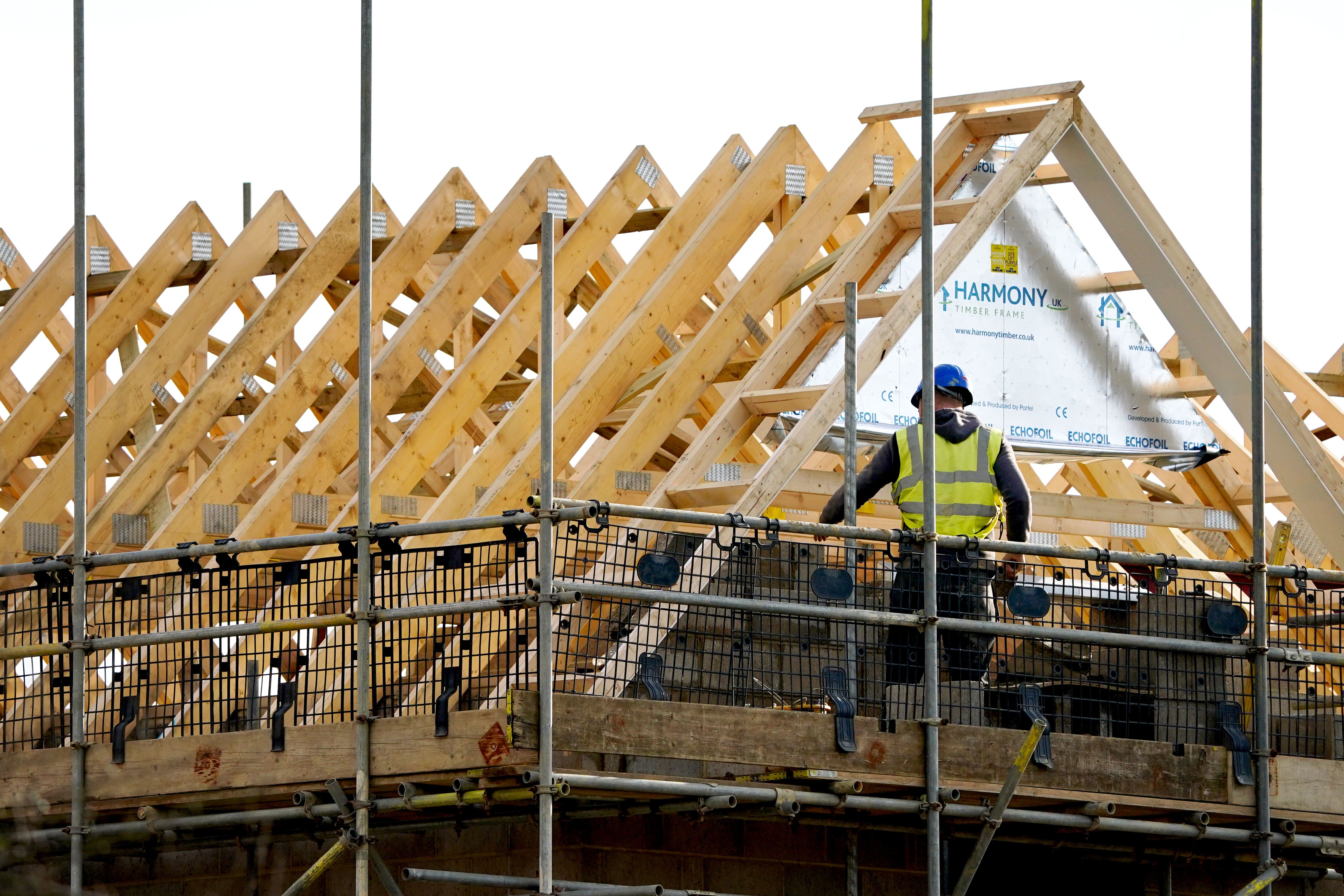 The housing minister has called for more British workers in construction, saying the sector cannot ‘rely’ on a foreign workforce. (Gareth Fuller/PA)