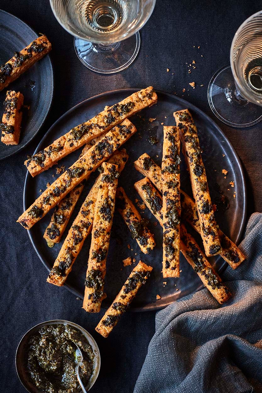 Elevate your martini game with these flaky, spicy cheese straws that scream sophistication