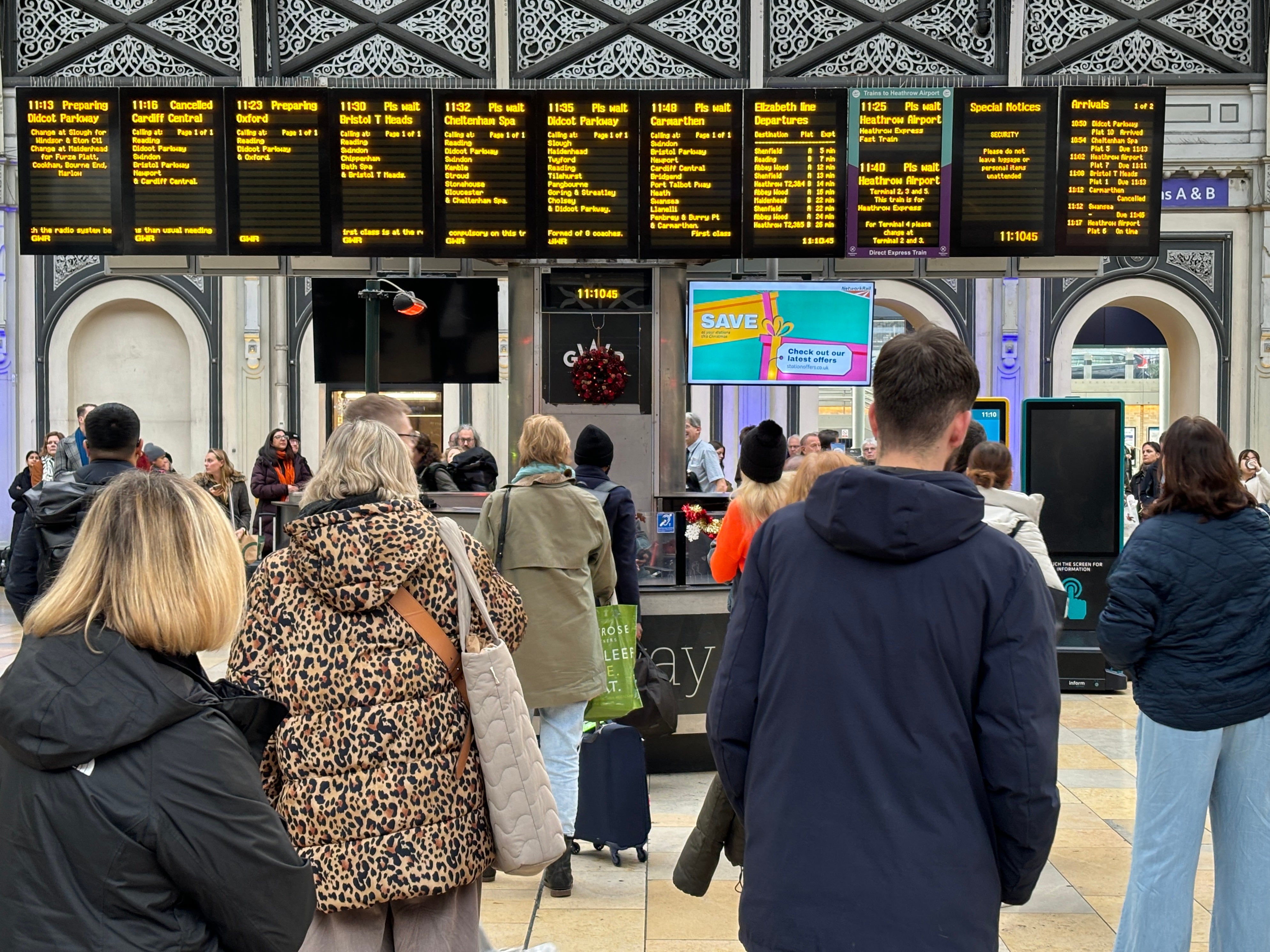 Passengers wait in Paddington as numerous services are delayed