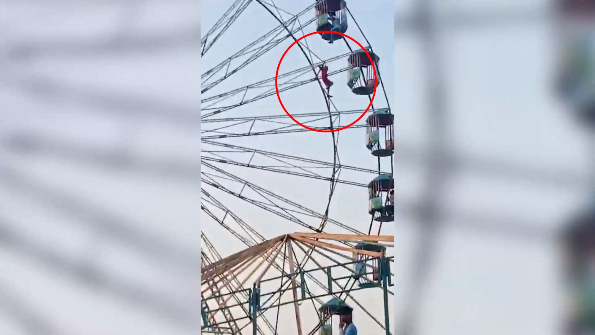 <p>Terrifying moment 13-year-old left dangling 60 feet above ground on ferris wheel</p>