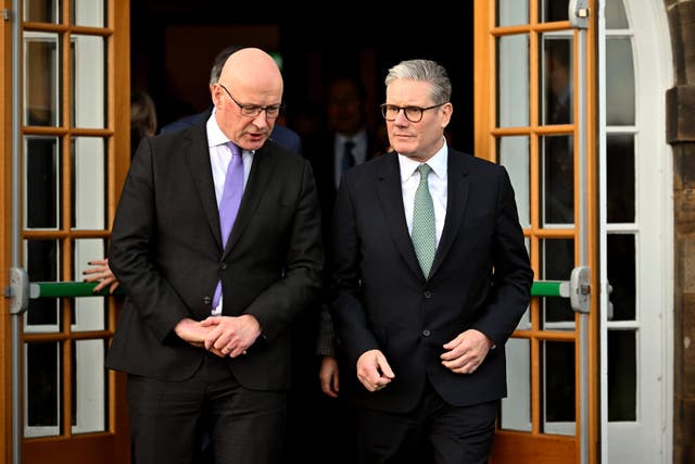 John Swinney (left) said Prime Minister Sir Keir Starmer has pledged to ‘work constructively’ as the Scottish Government seeks to end the two-child cap on some benefits (Andy Buchanan/PA)