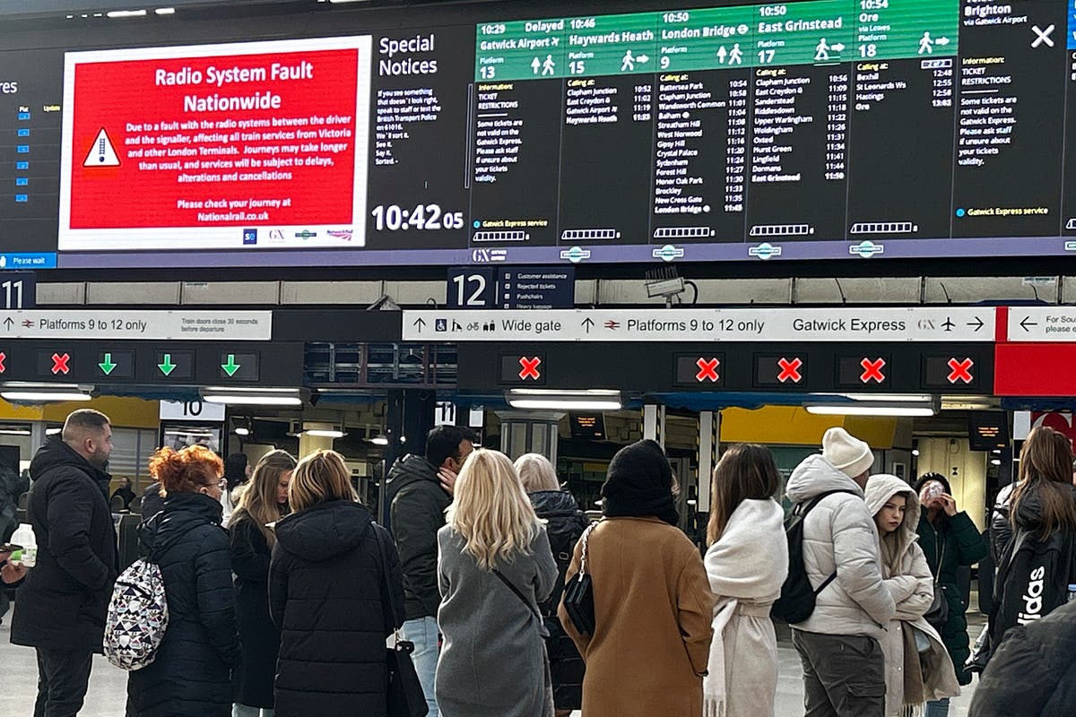 UK rail travel returns to normal after problems with a radio system disrupted the morning commute