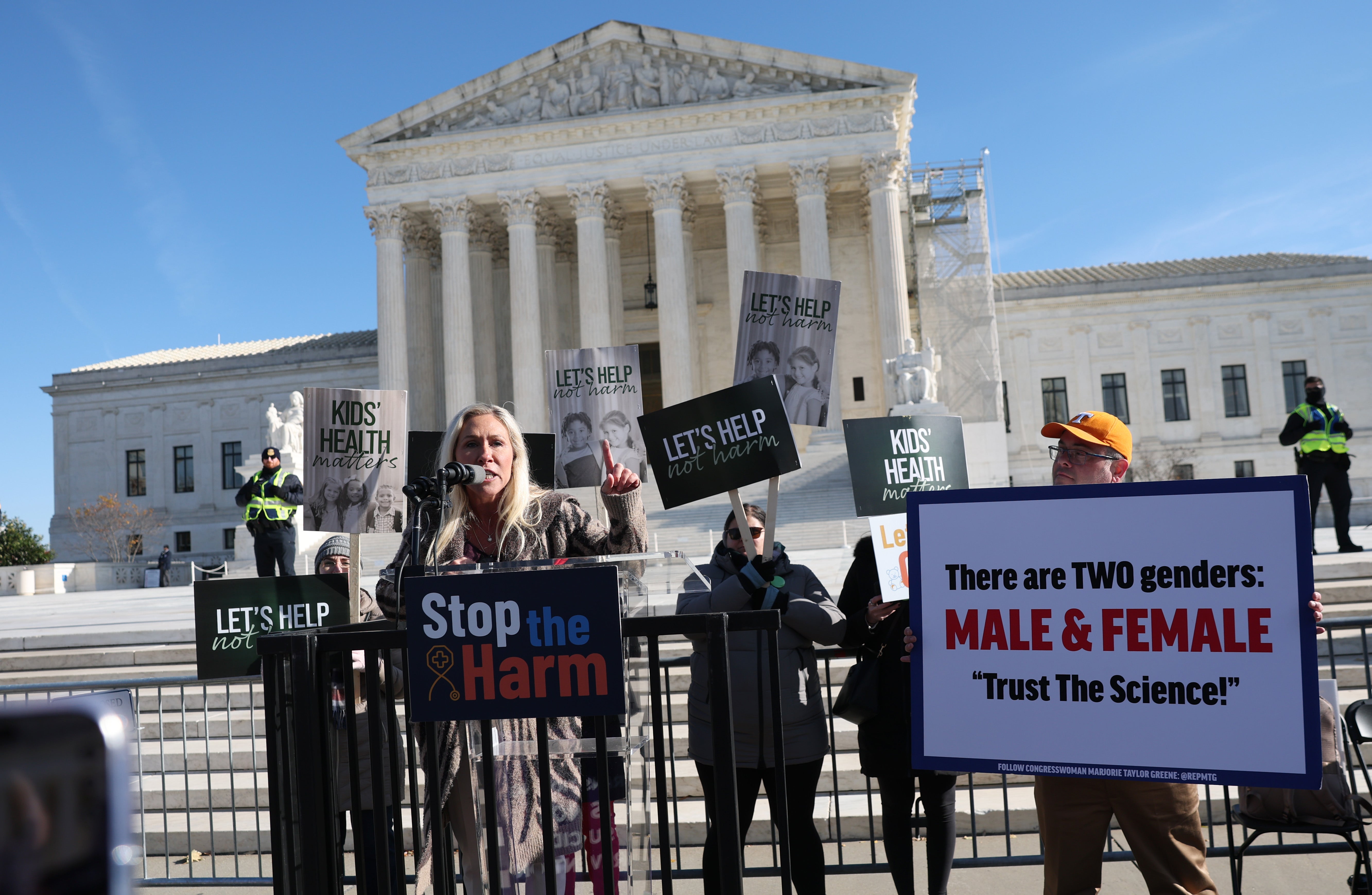 Rep. Marjorie Taylor Greene (R-GA) speaks outside the U.S. Supreme Court during a rally as the high court hears arguments in a case on transgender health rights this week in Washington, D.C. She argued that children are taking pills to ‘destroy their bodies’