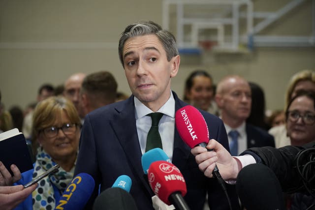 Simon Harris speaks to the media (Niall Carson/PA)