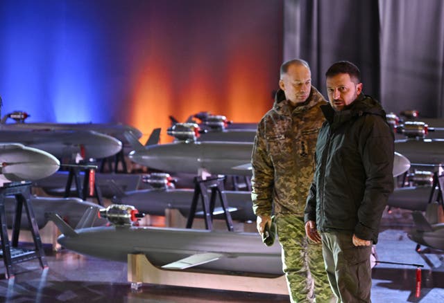 <p>Volodymyr Zelensky and Oleksandr Syrskyi, commander-in-chief of the Armed Forces of Ukraine, next to Ukrainian-made ‘Peklo’ drone missiles</p>