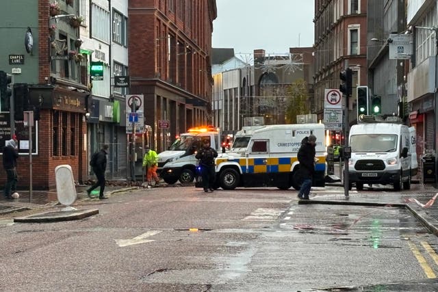 A clean-up operation under way in Castle Street in Belfast following a night of high winds amid Storm Darragh (Rebecca Black/PA)