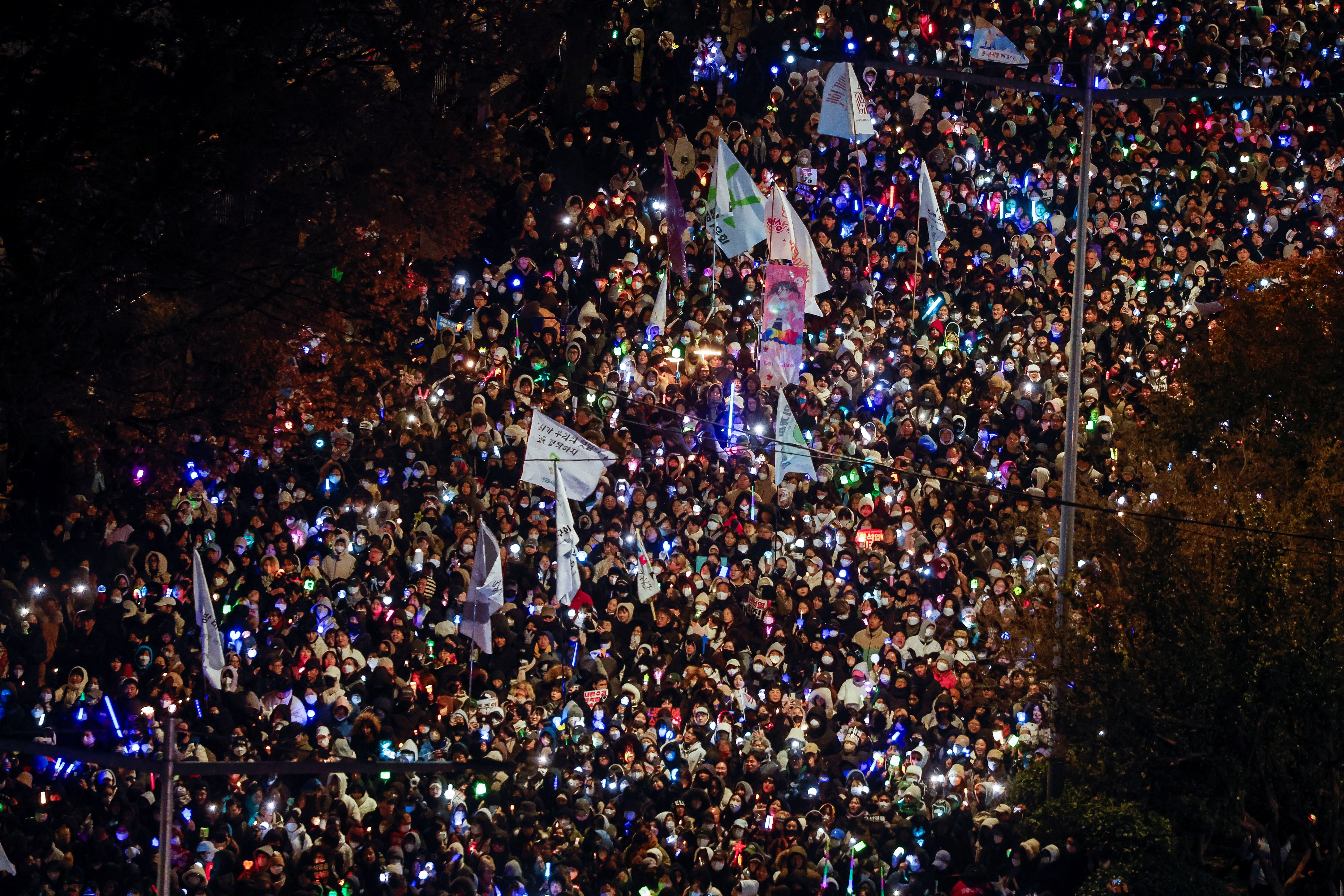 Protesters take part in a rally calling for the impeachment of the South Korean president