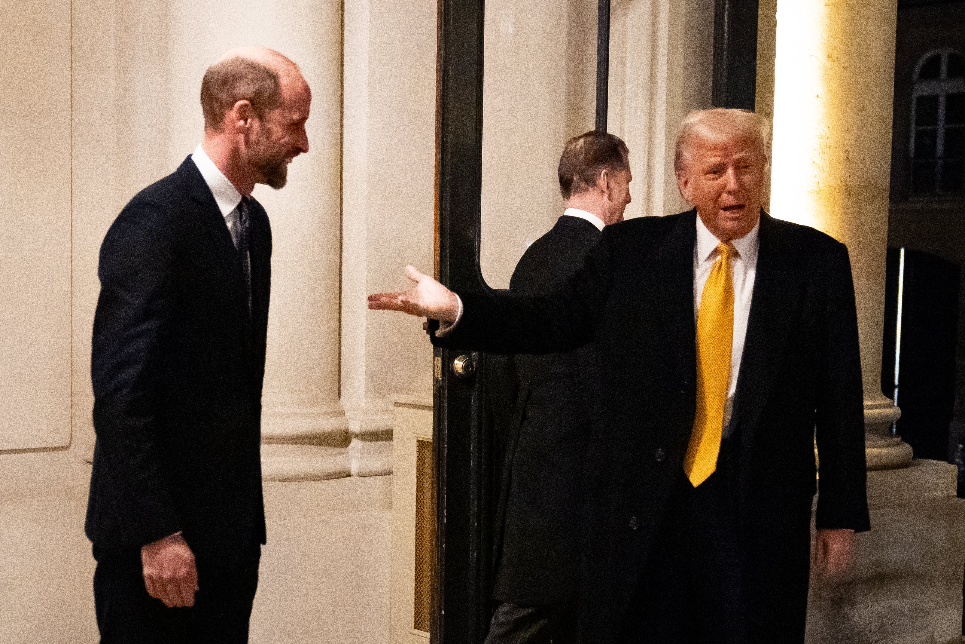 Donald Trump talks to reporters after meeting Prince William for a second time in Paris