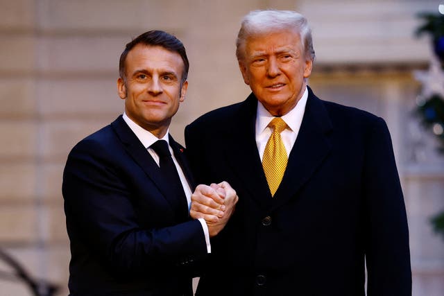 <p>French President Emmanuel Macron and President-elect Donald Trump hold their firm handshake while meeting on Saturday </p>