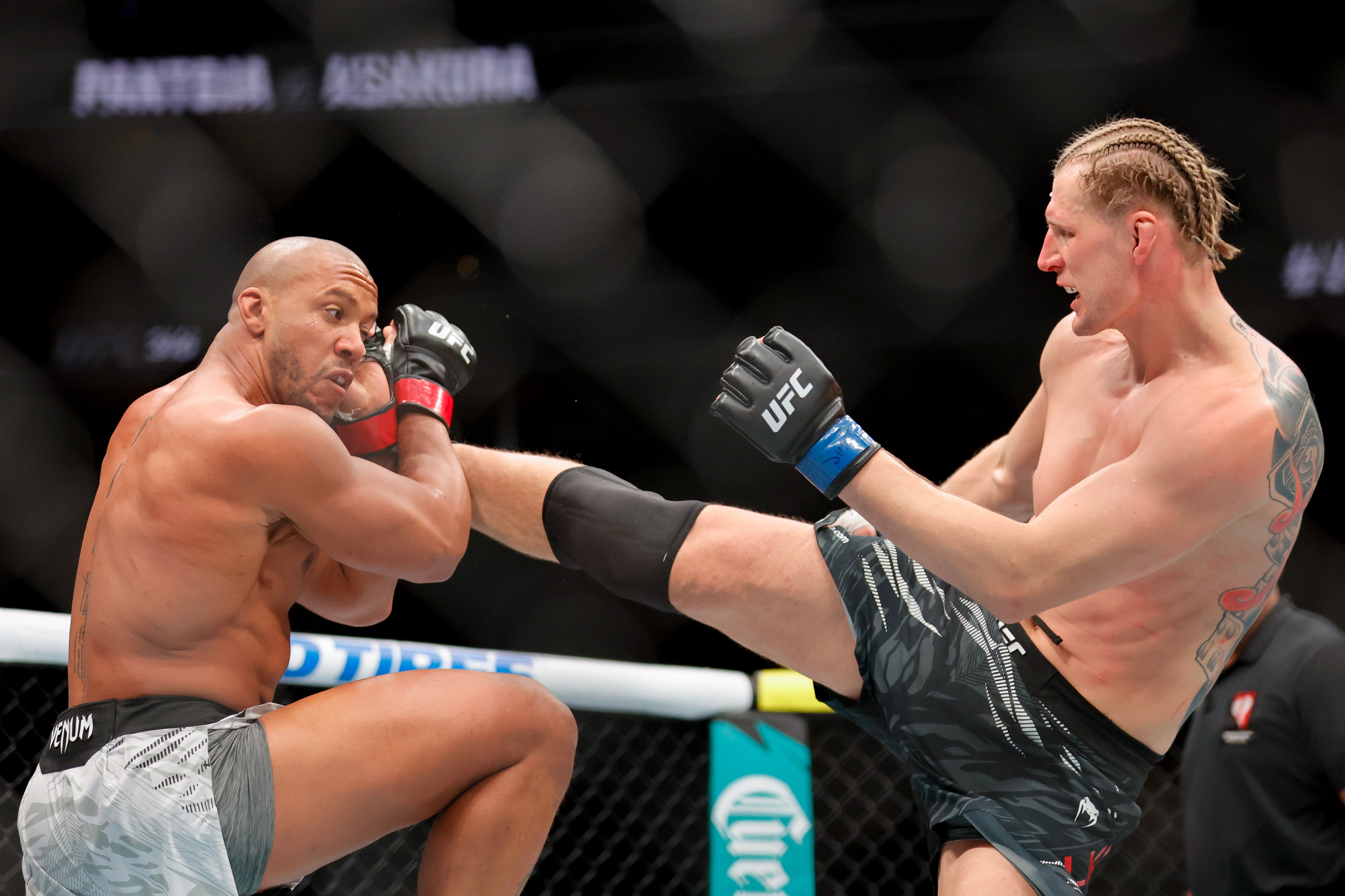 Ciryl Gane (left) holds two wins over Alexander Volkov, though the latter was controversial