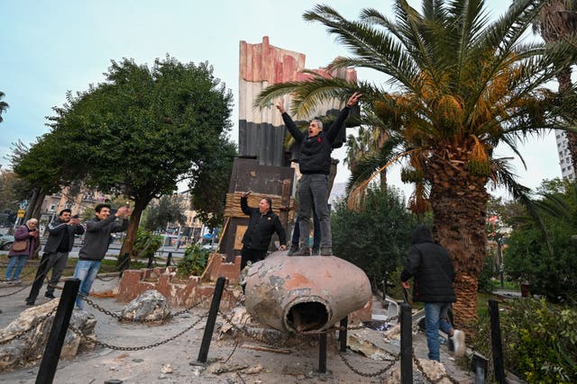 <p>Celebrations erupted in Damascus after rebels toppled the Assad regime </p>