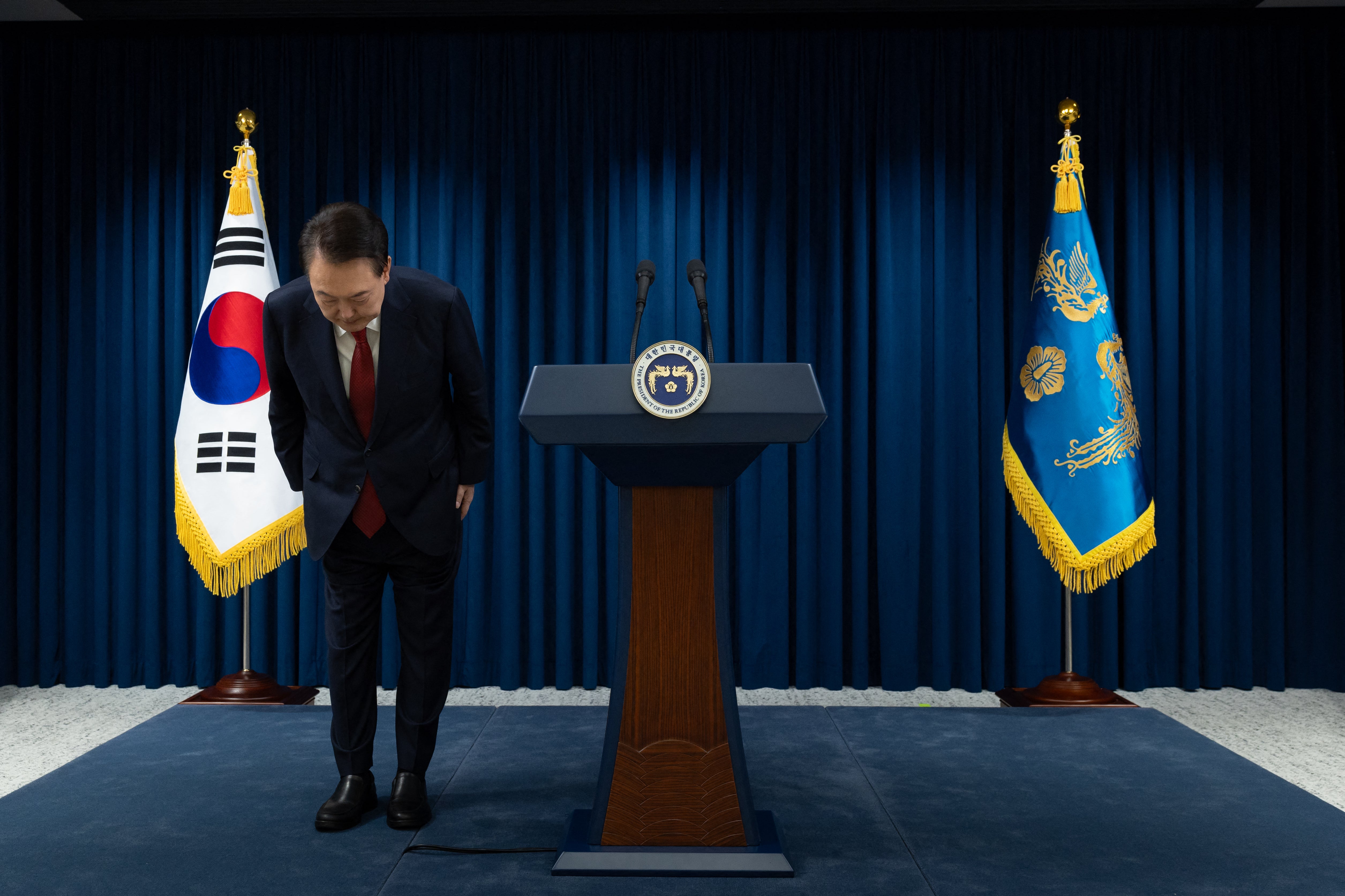 President Yoon Suk Yeol bowing after the end of his address at the Presidential Office in Seoul on Saturday