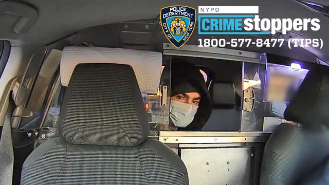 <p>The man suspected of shooting UnitedHealthcare CEO Brian Thompson pictured in a taxi in a new photo released by the New York Police Department</p>