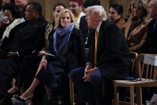 <p>President-elect Donald Trump and First Lady Jill Biden talk at the reopening ceremony for Paris’s Notre Dame Cathedral </p>