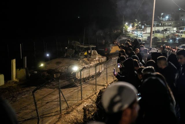 <p>An Israeli military vehicle near the Alpha Line that separates Israeli occupied Golan Heights from Syria</p>