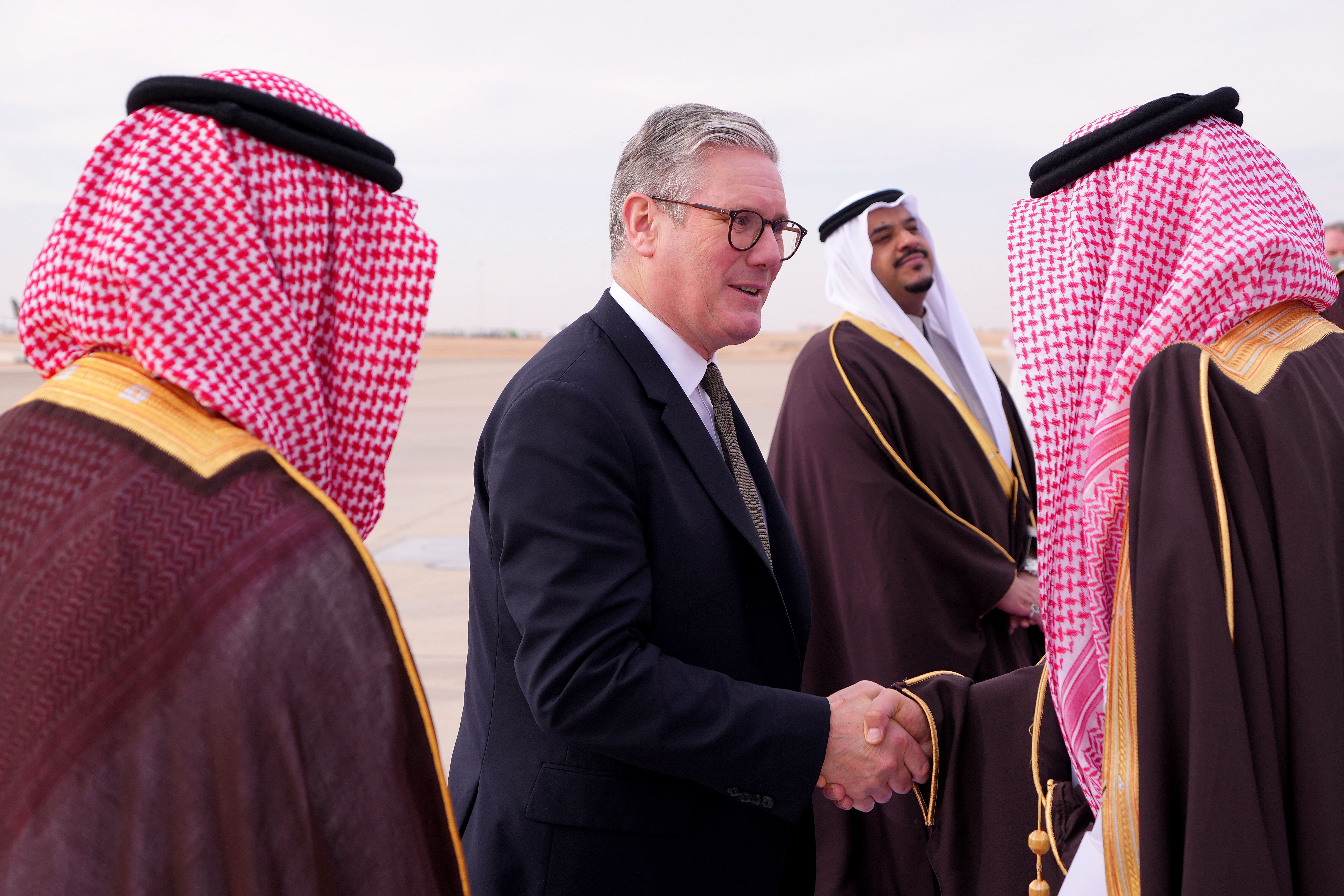 Prime Minister Sir Keir Starmer is greeted during a ceremonial arrival at King Khalid International Airport in Riyadh, Saudi Arabia (Kirsty Wigglesworth/PA)