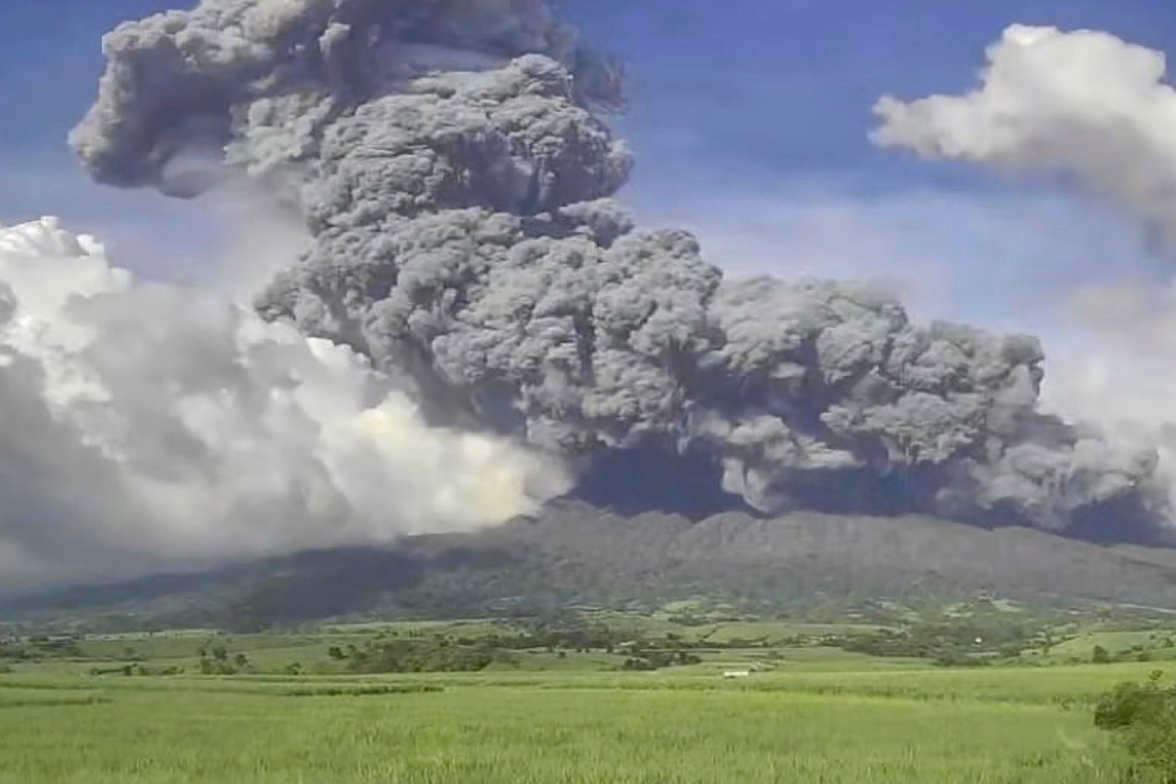 The eruption of Mount Kanlaon volcano is seen from Mansalanao, Philippines, on 9 December 2024