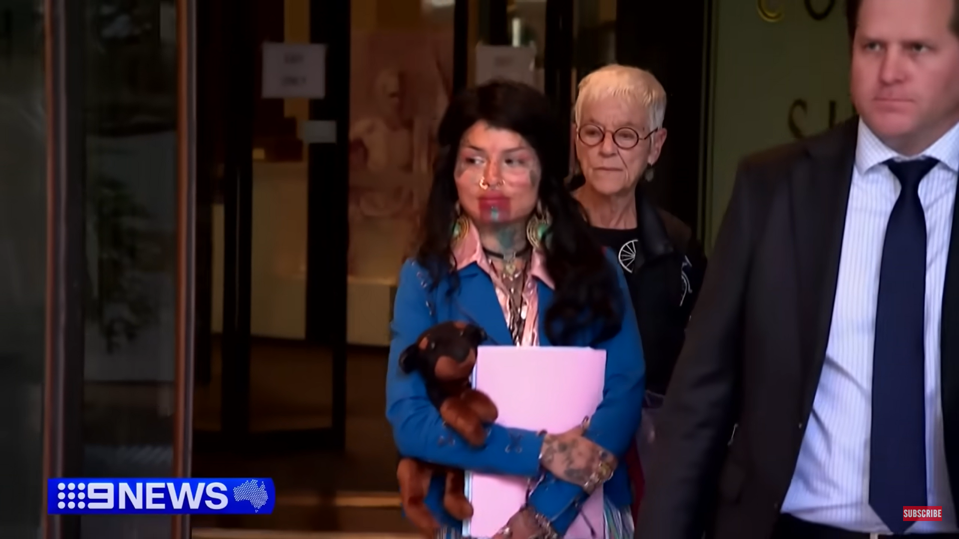 A sreengrab shows Liliana Goodson, 30, coming out of a court during one of the hearings