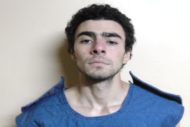 <p>Luigi Mangione, 26, a suspect in the New York City killing of UnitedHealth executive Brian Thompson, poses for a booking photo </p>