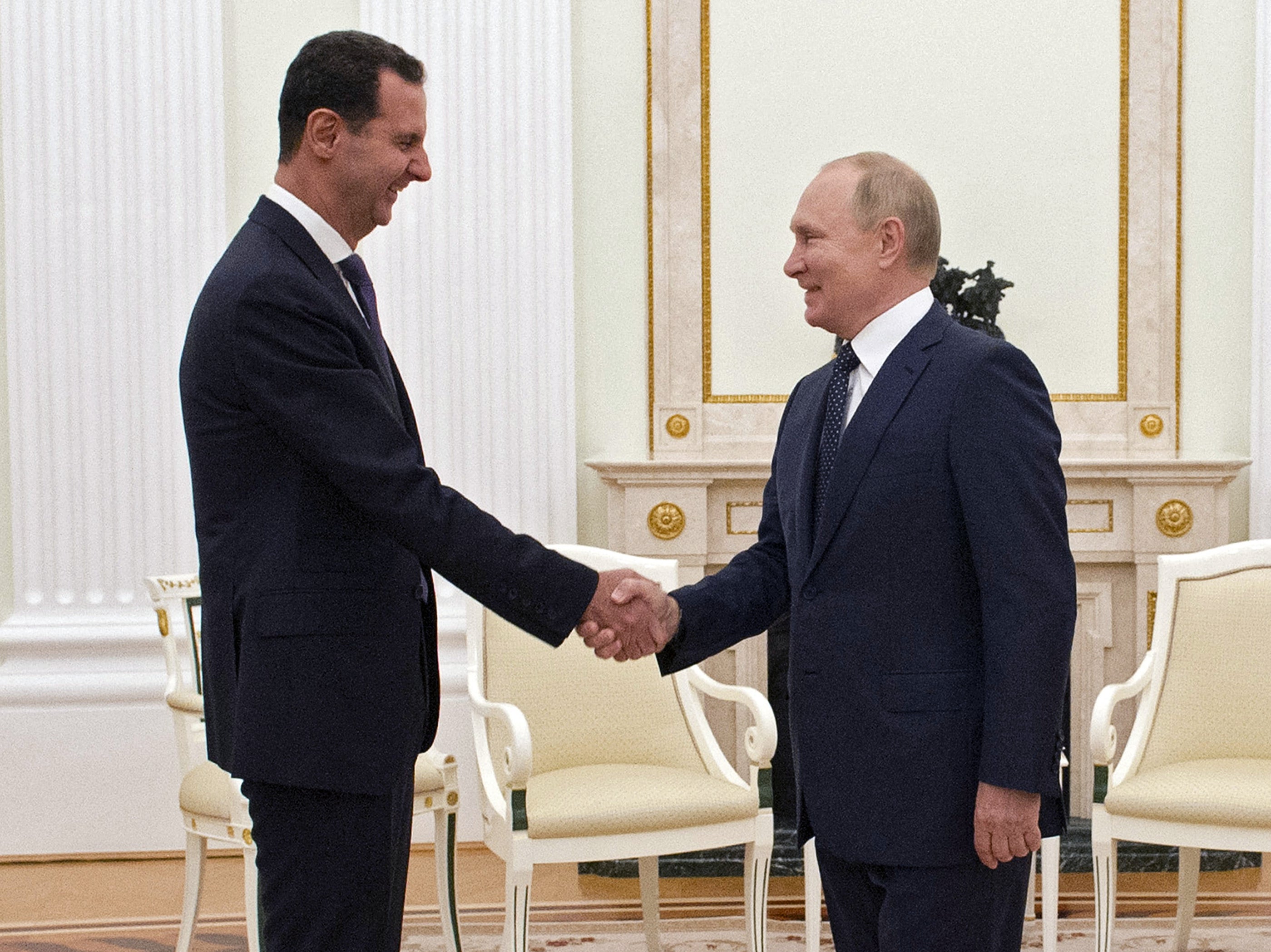 Toppled Syrian dictactor Bashar al-Assad during a previous meeting with Vladimir Putin