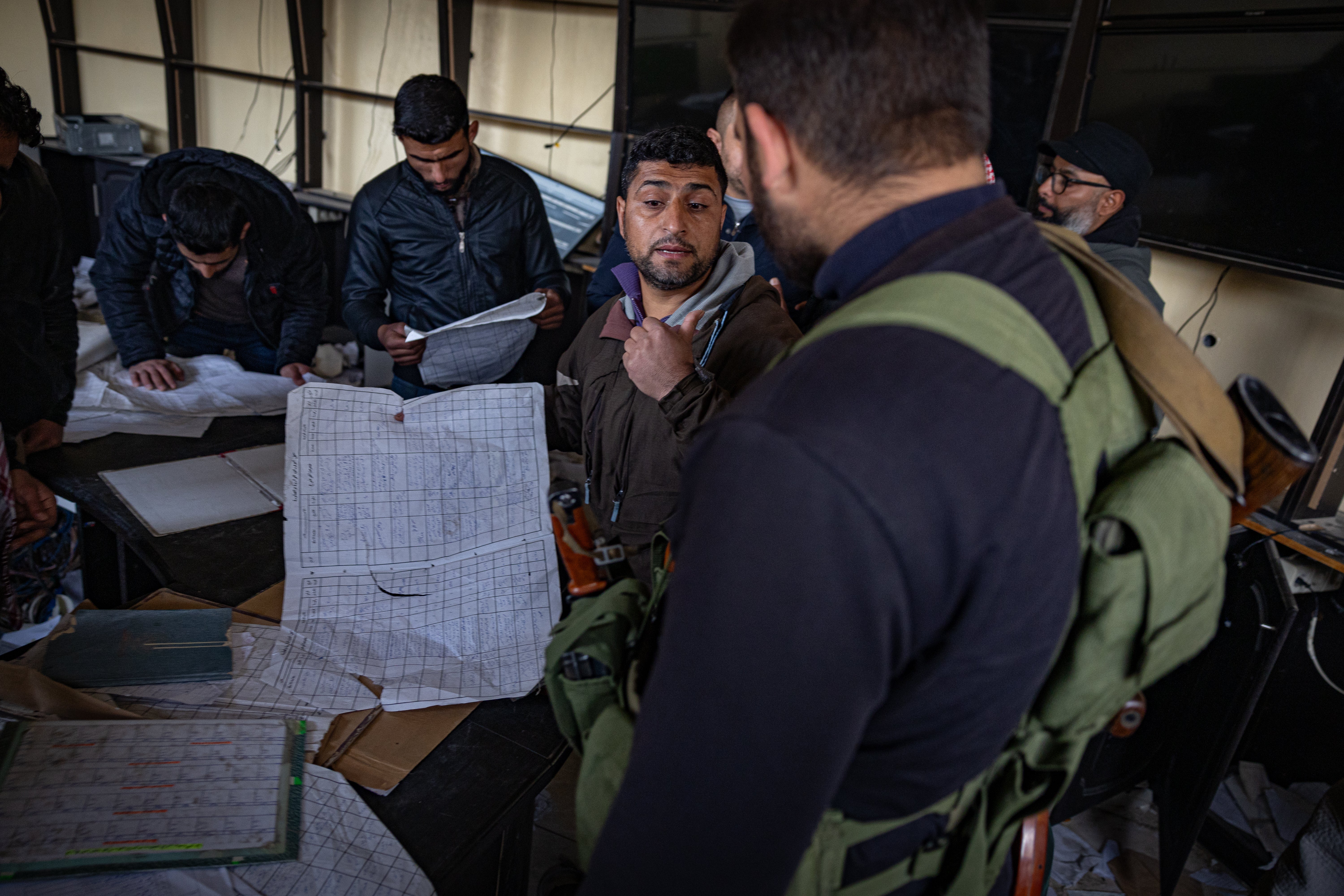 Relatives search records at the notorious Sednaya prison in Damascus for signs of missing loved ones